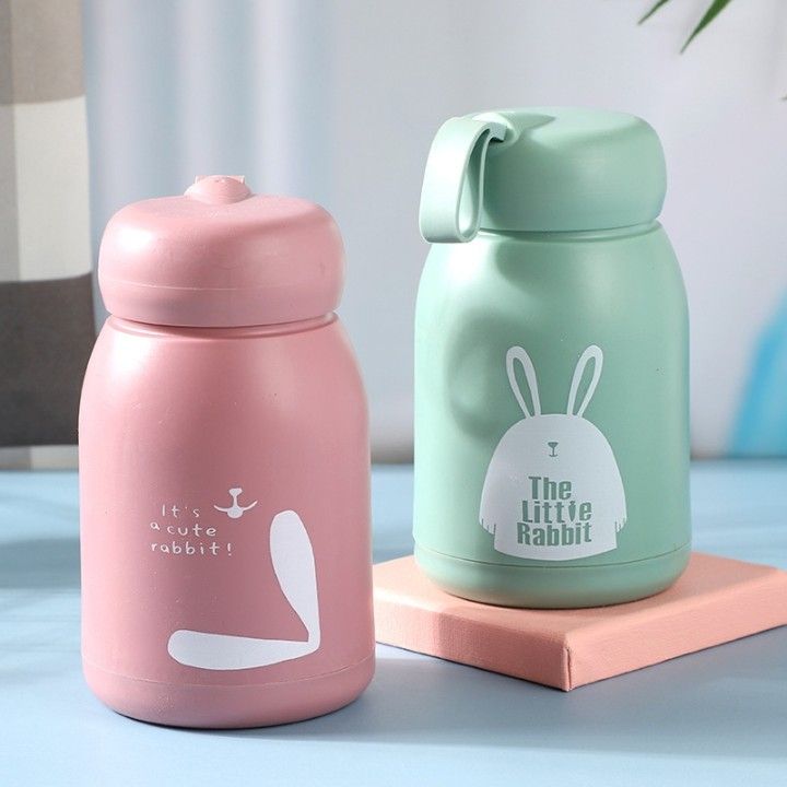 Rabbit bottle showing ear detail and cap