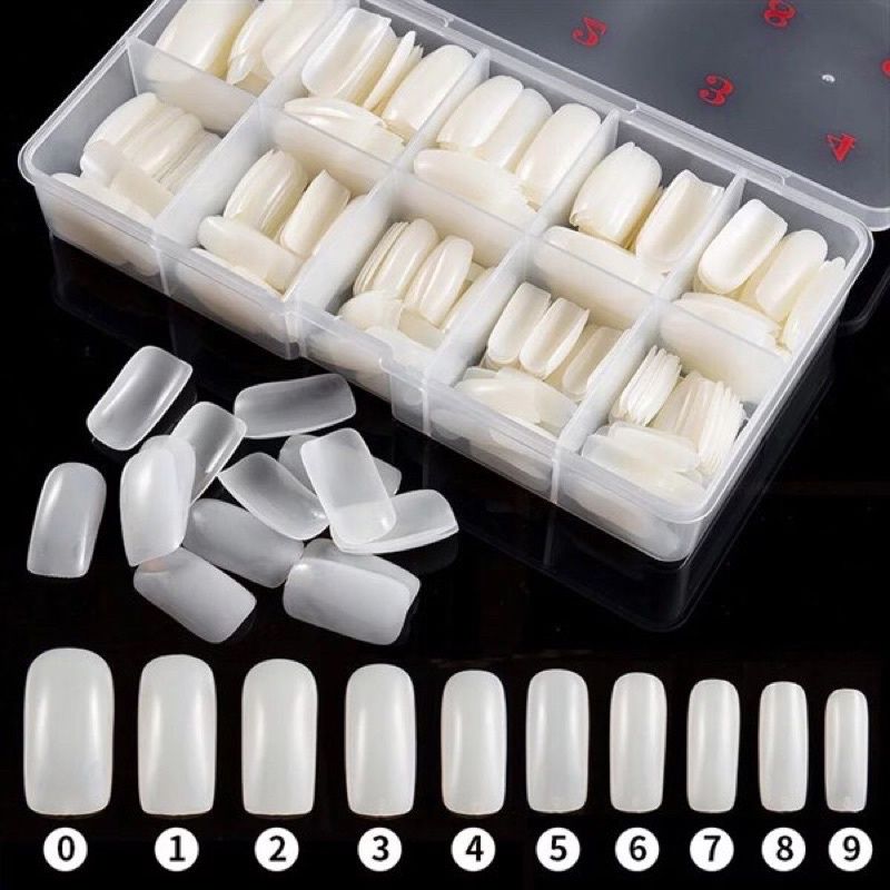 White square nails close-up showing opaque finish